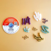 Mes bijoux DIY - Kit de 4 pulseras elásticas con cuentas tubulares - Versión dorada