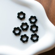 Colgante flor acrílico 14 mm - purpurina negra x1