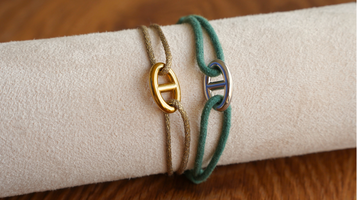 Esquema Dúo de pulseras de cordón y malla azul marino Esquema Dúo de pulseras de cordón y malla azul marino