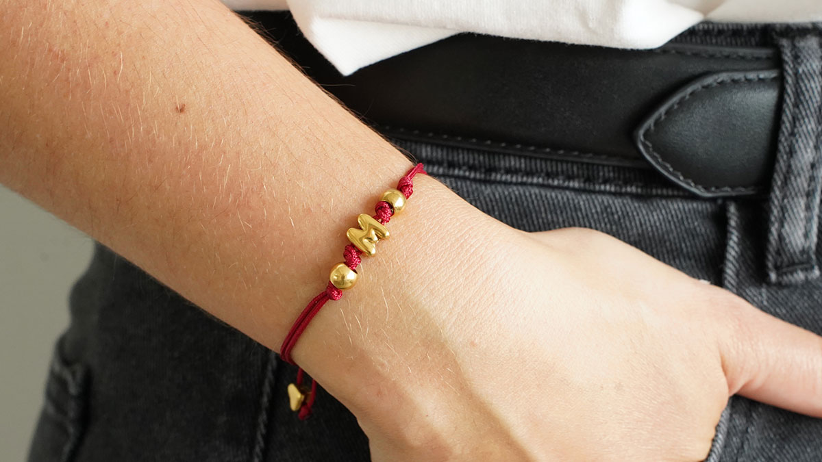 Pulsera de cordón con letra de acero inoxidable Pulsera de cordón con letra de acero inoxidable